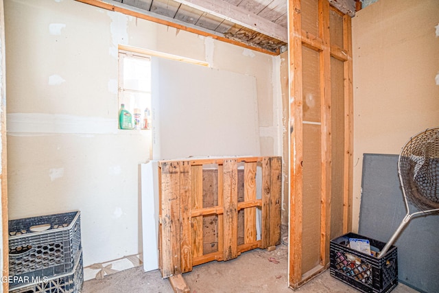 interior space featuring unfinished concrete floors