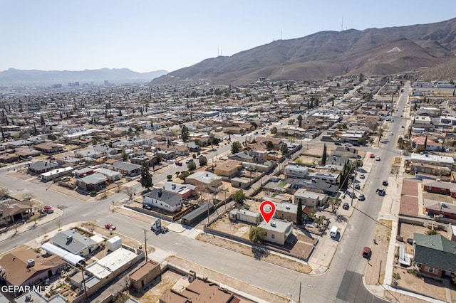 aerial view featuring a mountain view and a residential view