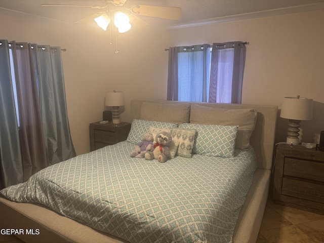 bedroom featuring ceiling fan