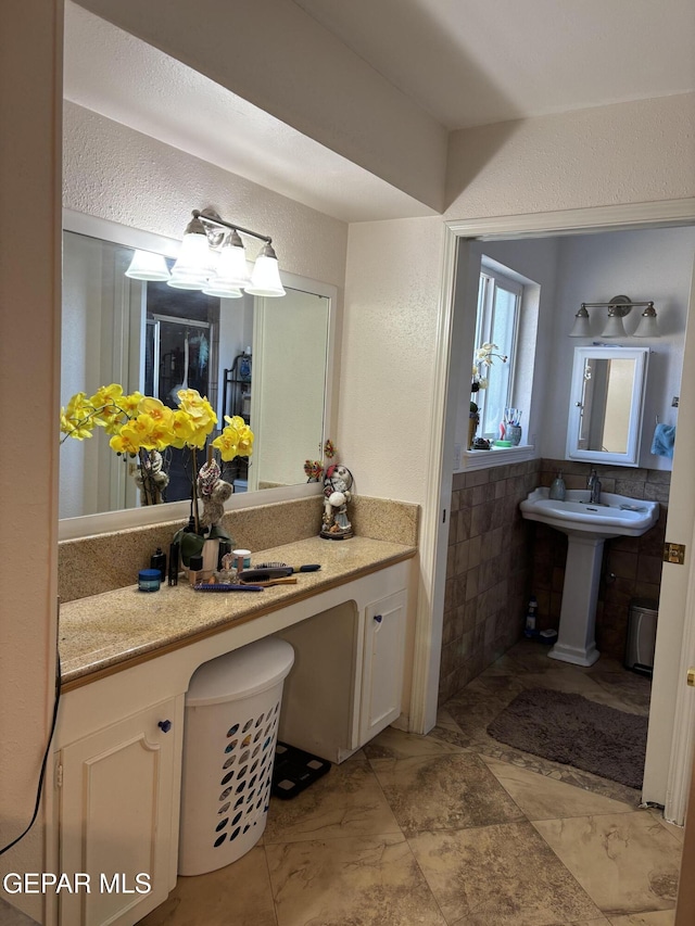 bathroom with a textured wall