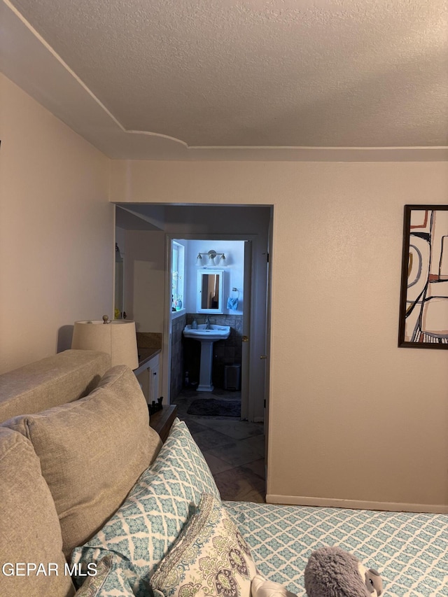 living room featuring a textured ceiling