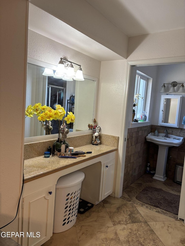 bathroom with a textured wall