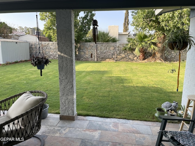 6908 Oveja Ave, El Paso, TX 79912 - view of yard featuring a patio and a fenced backyard