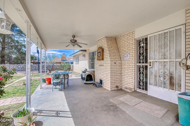 view of patio / terrace featuring ceiling fan