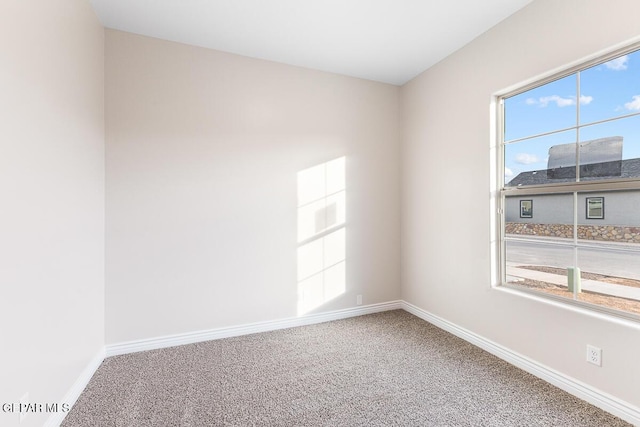935 Bromyard Dr, Horizon City, TX 79928 - unfurnished room featuring baseboards, carpet, and a healthy amount of sunlight