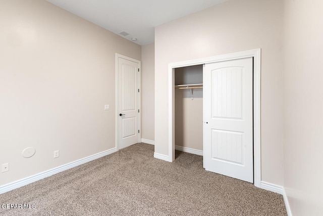 935 Bromyard Dr, Horizon City, TX 79928 - unfurnished bedroom featuring a closet, carpet flooring, visible vents, and baseboards