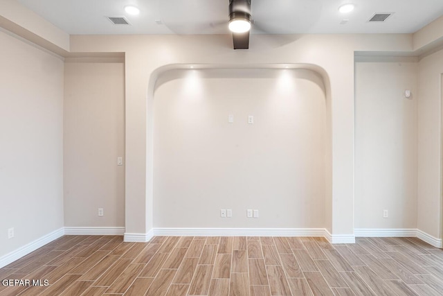 935 Bromyard Dr, Horizon City, TX 79928 - spare room featuring baseboards, visible vents, and wood finish floors