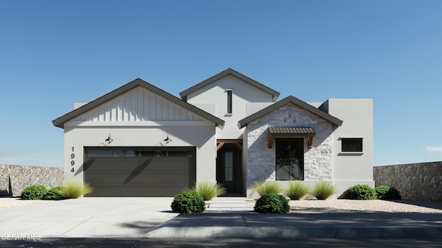 view of front of home with concrete driveway, a garage, stone siding, and stucco siding