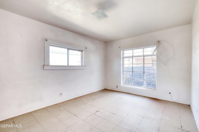 5930 Cleveland Ave, El Paso, TX 79905 - spare room with tile patterned floors