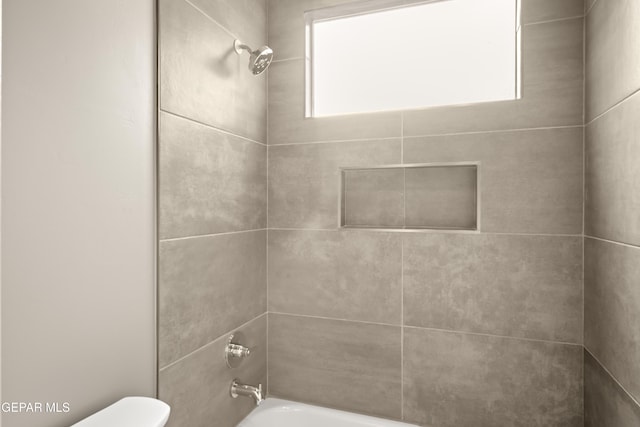 full bathroom with shower / tub combination and toilet