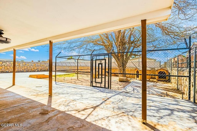 view of patio / terrace featuring fence