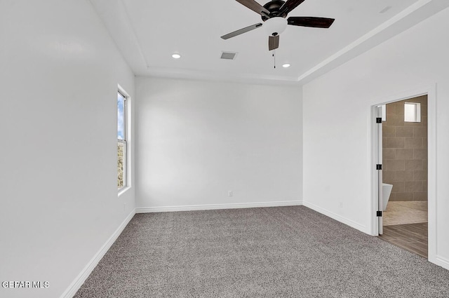 empty room featuring visible vents, carpet flooring, recessed lighting, and baseboards