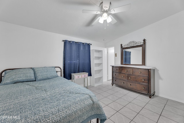 bedroom featuring light tile patterned floors and a ceiling fan