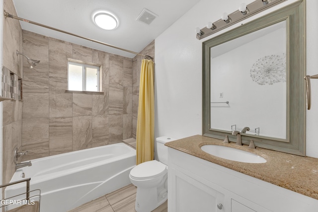 full bath with visible vents, toilet, vanity, and shower / bath combination with curtain