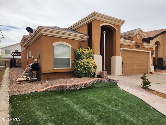 view of front of house with stucco siding, an attached garage, driveway, and fence