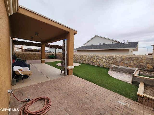 view of patio with a fenced backyard