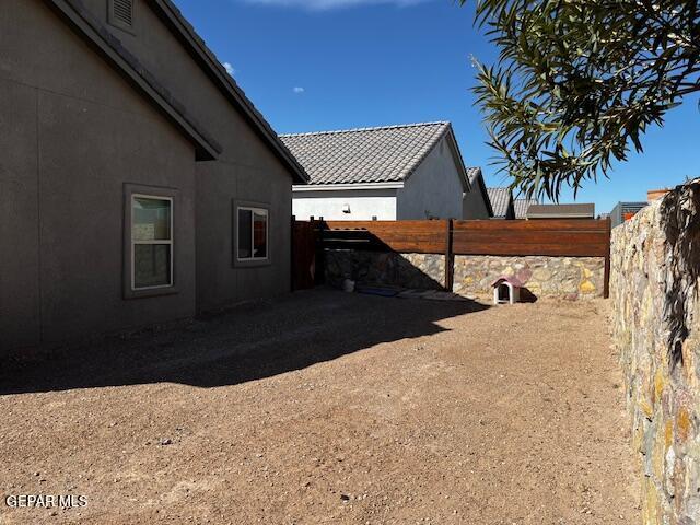 view of yard featuring fence