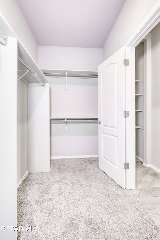 1722 Breeder Cup Way, El Paso, TX 79928 - spacious closet featuring carpet