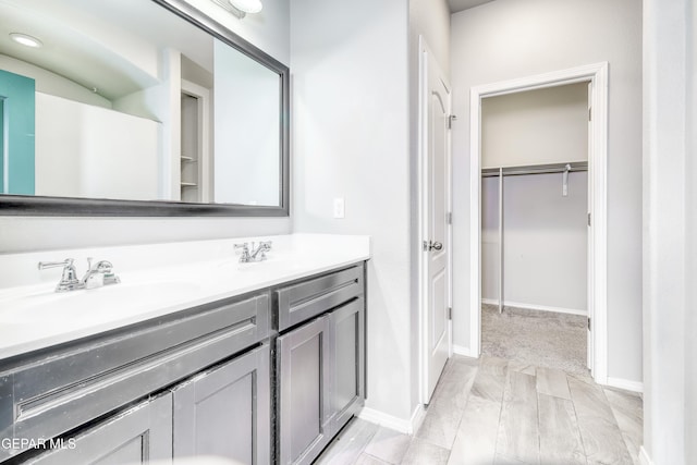 1722 Breeder Cup Way, El Paso, TX 79928 - full bath featuring double vanity, baseboards, and a spacious closet