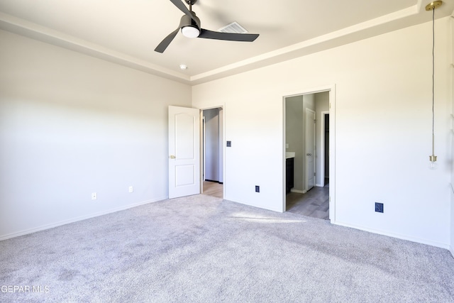 1722 Breeder Cup Way, El Paso, TX 79928 - unfurnished bedroom with light colored carpet, baseboards, a ceiling fan, and ensuite bathroom