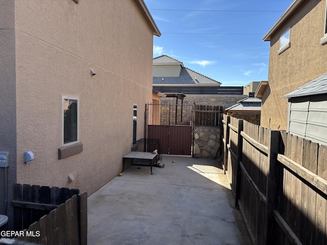 view of patio with fence