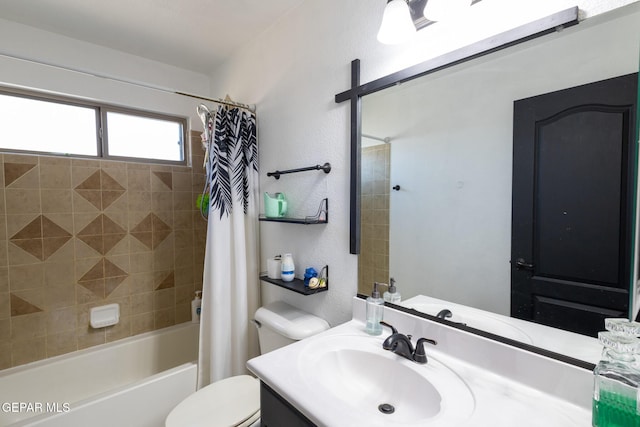 full bathroom featuring a textured wall, toilet, vanity, and shower / bath combination with curtain