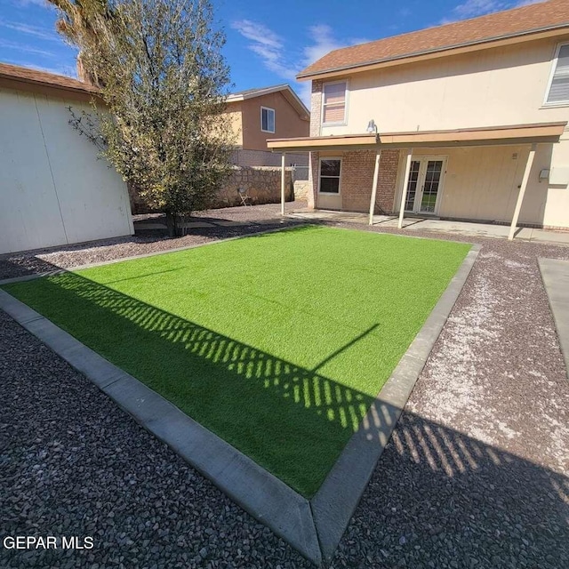 view of yard with a patio area and fence