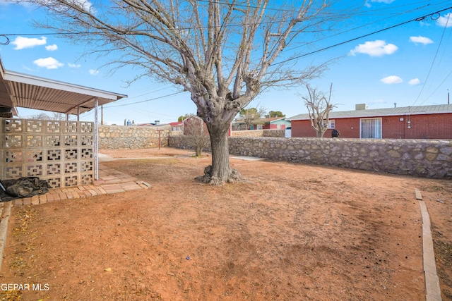 view of yard with fence