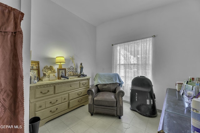 living area with light tile patterned floors