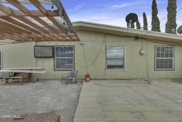 back of house with a pergola