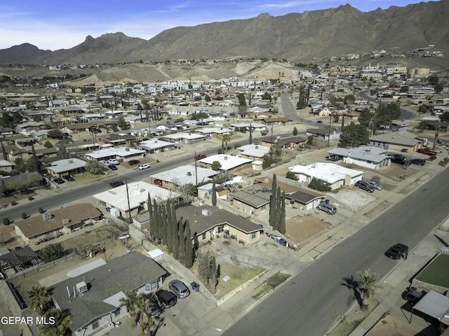 birds eye view of property featuring a mountain view and a residential view