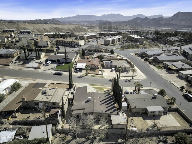 aerial view featuring a mountain view and a residential view