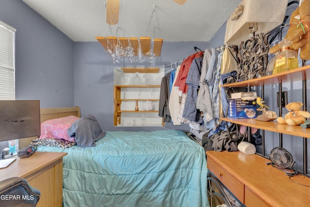 bedroom featuring a textured ceiling