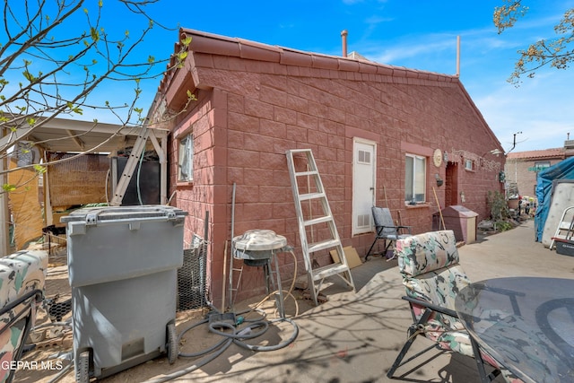 rear view of property with a patio