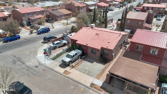 birds eye view of property with a residential view