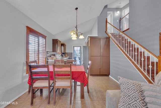 dining area with stairs, light tile patterned floors, baseboards, and a chandelier