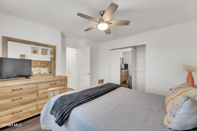 bedroom with a closet and ceiling fan