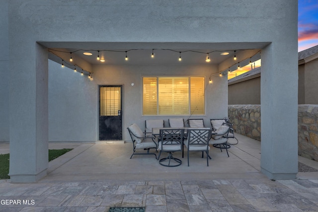 view of patio with outdoor dining area