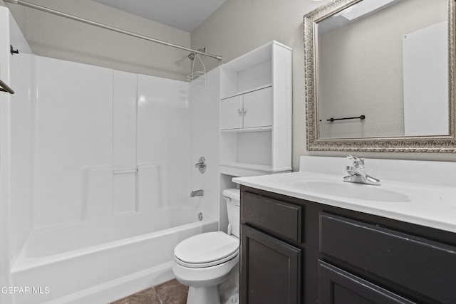 bathroom featuring vanity, shower / bathing tub combination, toilet, and tile patterned flooring