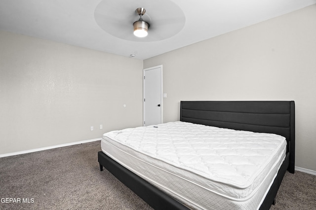 bedroom featuring carpet flooring, a ceiling fan, and baseboards