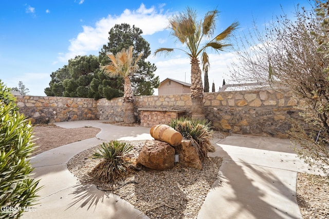 view of yard featuring a patio area and fence