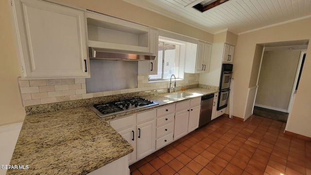 kitchen with ornamental molding, a sink, white cabinetry, appliances with stainless steel finishes, and exhaust hood