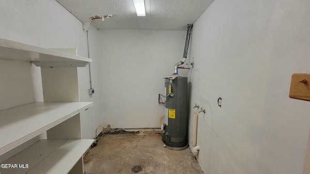 utility room featuring water heater