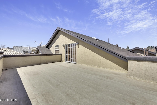 view of home's exterior with stucco siding