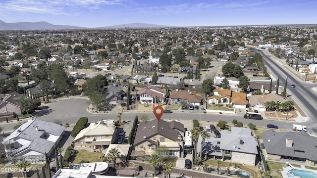 bird's eye view featuring a mountain view and a residential view