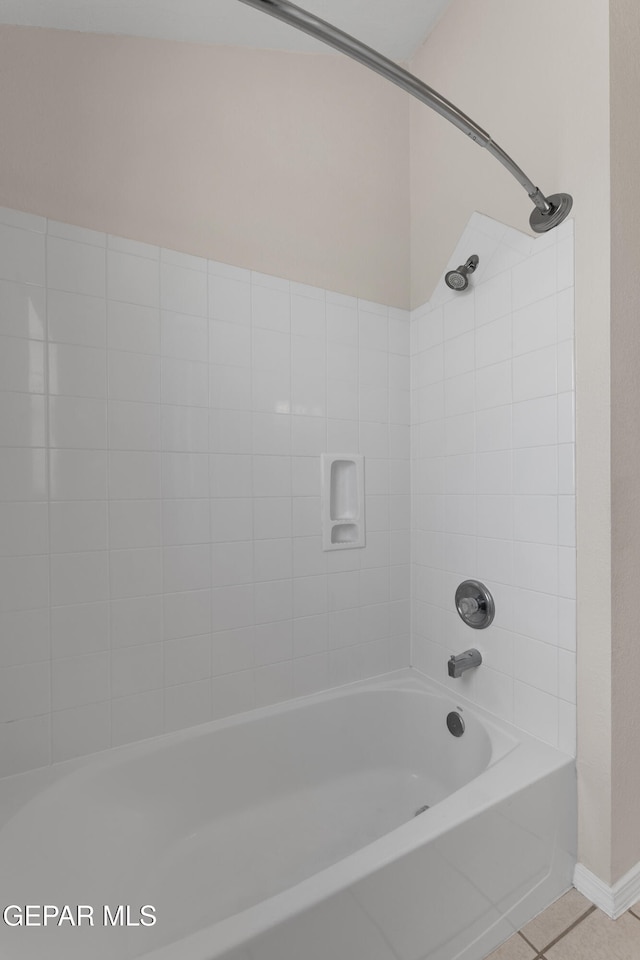 full bathroom featuring shower / bathing tub combination and tile patterned flooring