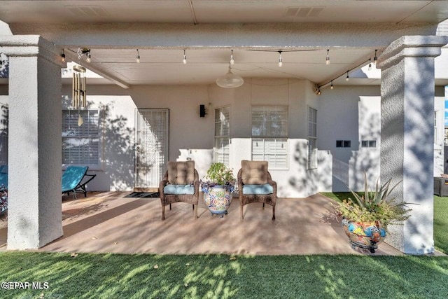 view of patio with visible vents