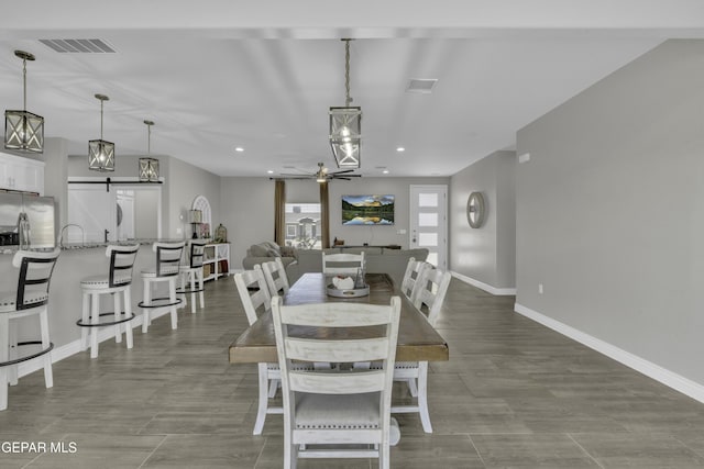 dining room with recessed lighting, a ceiling fan, visible vents, and baseboards