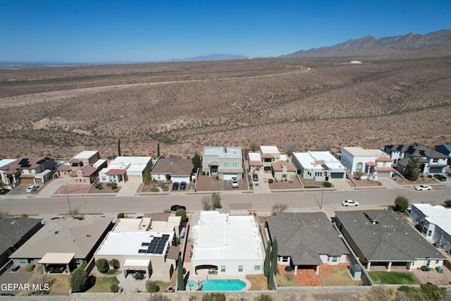 birds eye view of property featuring a residential view and a mountain view