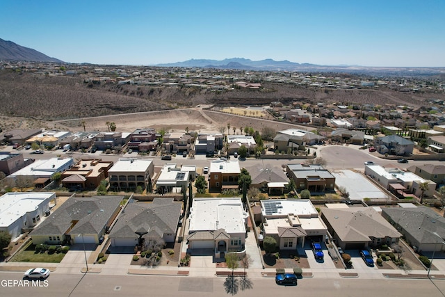 aerial view with a mountain view and a residential view